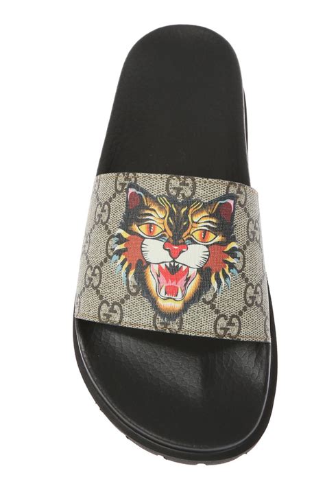 gucci tiger shoes fake|gucci tiger head slides.